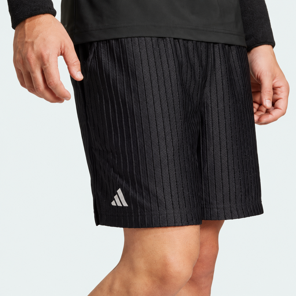 Detalhe complementar do Shorts Adidas