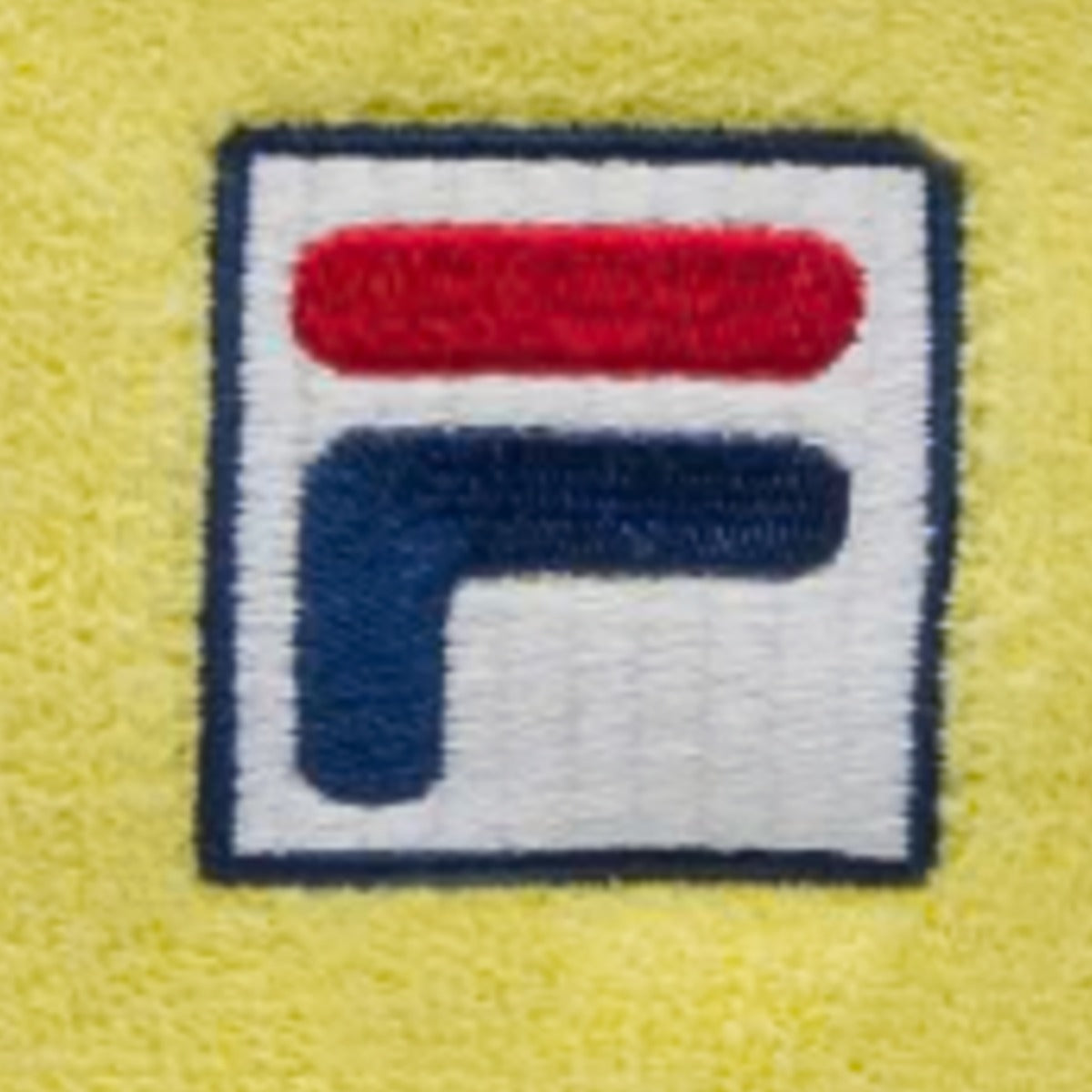Munhequeira Fila Longa Amarela - detalhe do logo